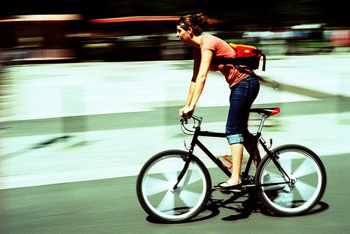 Woman on bike.