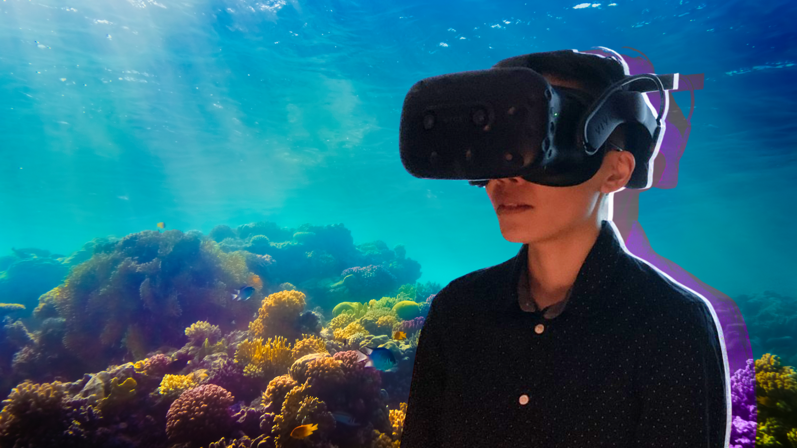 A young student wearing VR goggles, overtop of a coral reef background