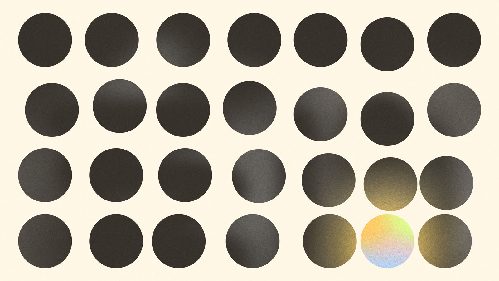Grid of black circles with one radiant circle in bottom row