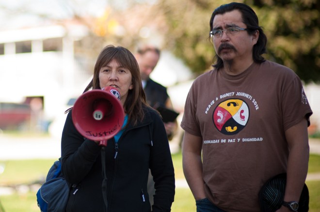 Freda Huson and Dini Ze Toghestiy at a Chevron protest in 2013. 