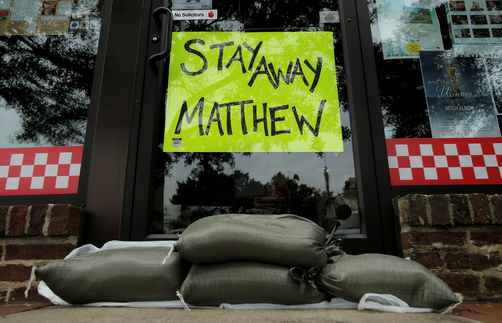 Sandbags are seen in front of a business ahead of Hurricane Matthew in Georgetown