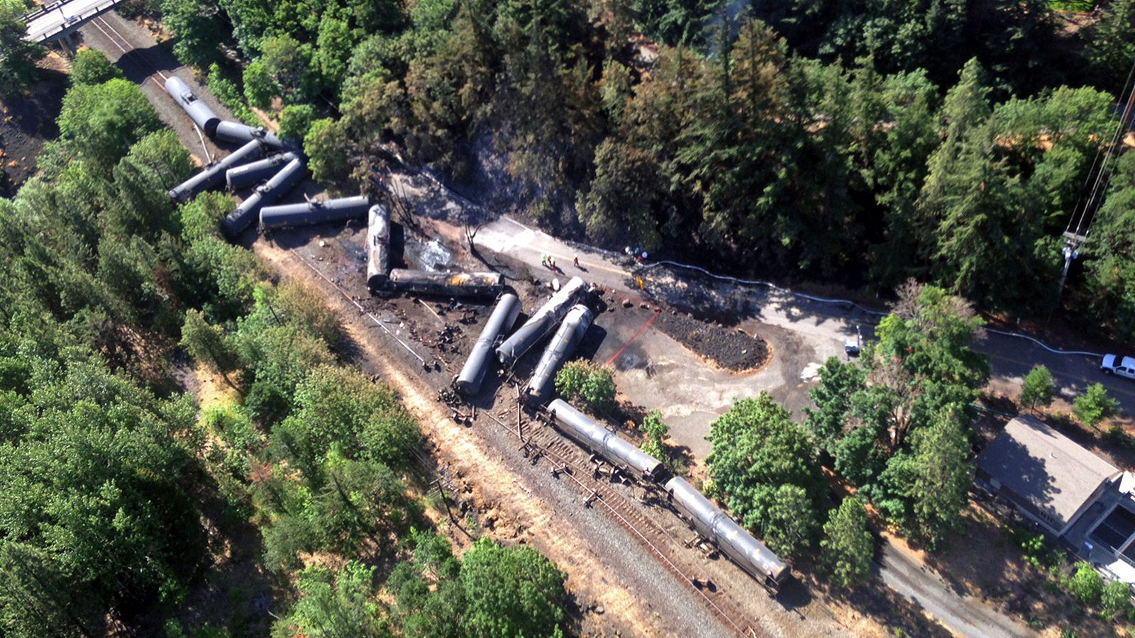 Scattered and burned oil tank cars after a train derailed and burned near Mosier, Oregon.