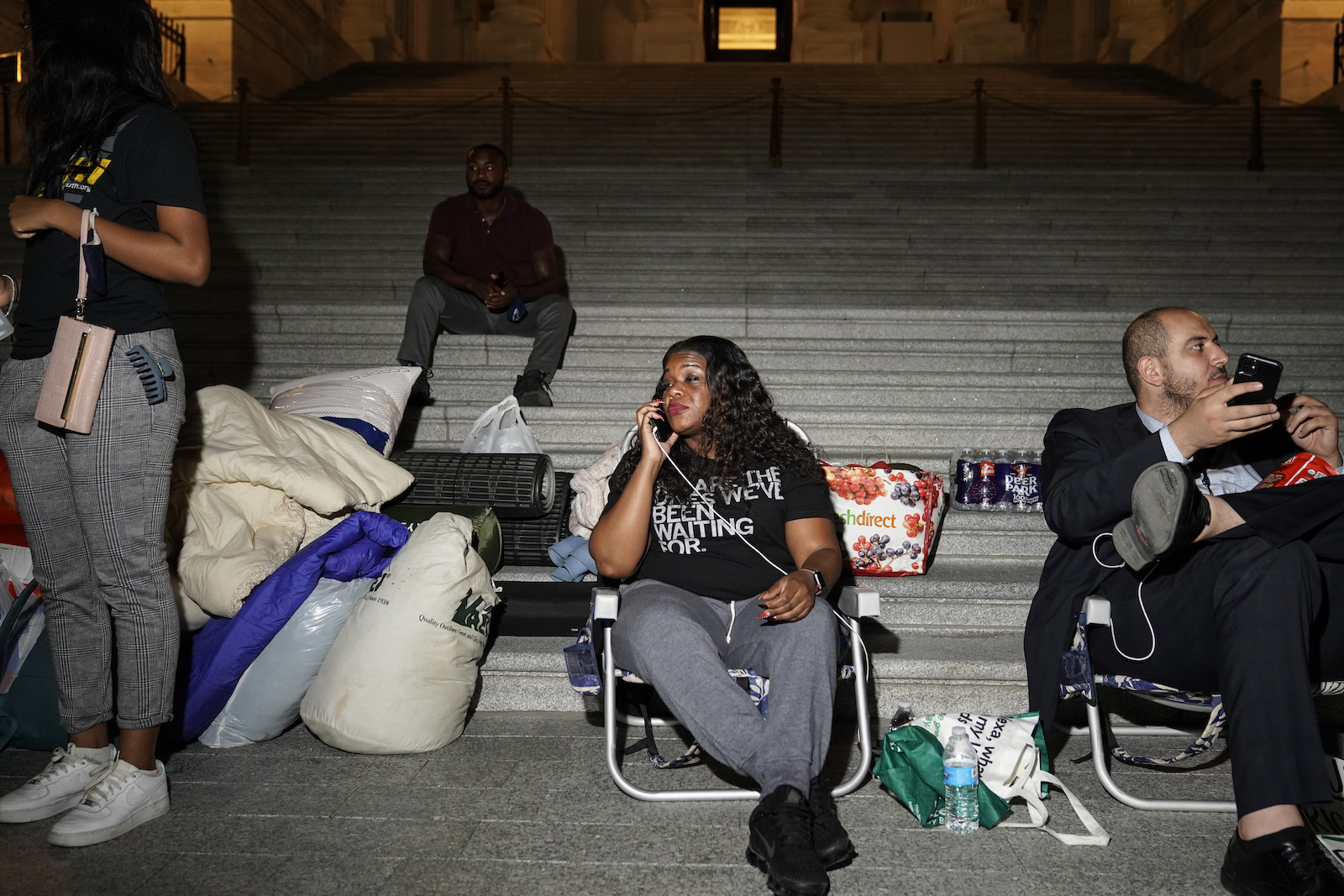 Cori Bush speaks with supporters as she spends the night outside the U.S. Capitol to call for for an extension of the federal eviction moratorium on July 31, 2021 in Washington, DC.