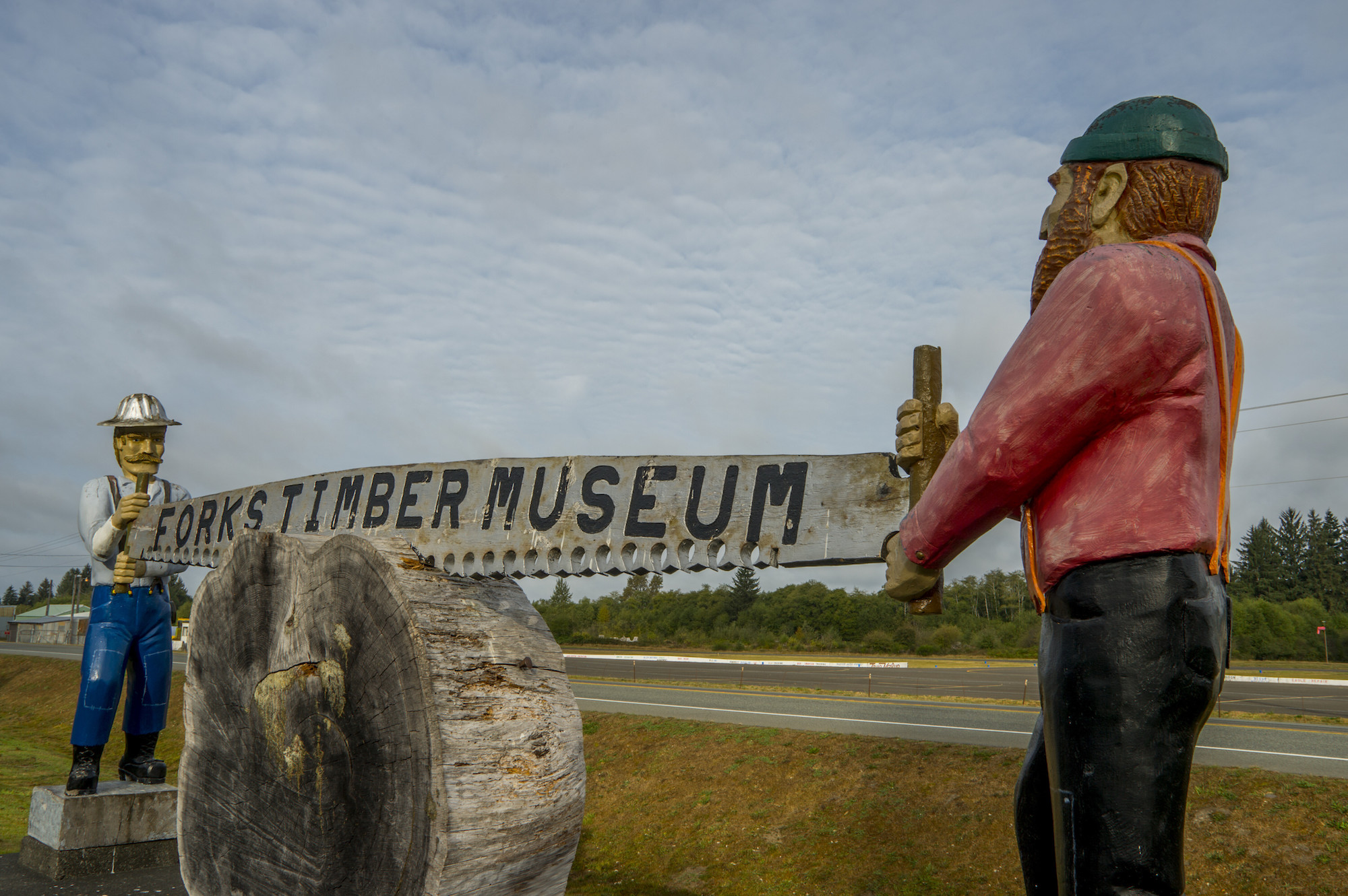 Wooden statue advertising the Forks Timber Museum in Forks, Washington