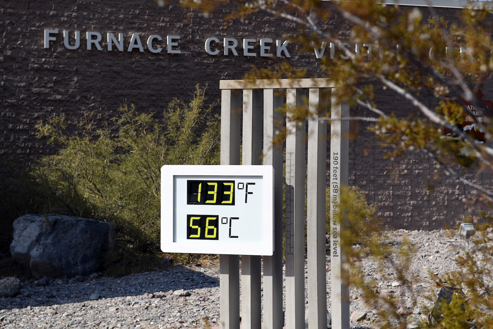 Photo: A sign showing a temperature of 133F in Death Valley, CA.