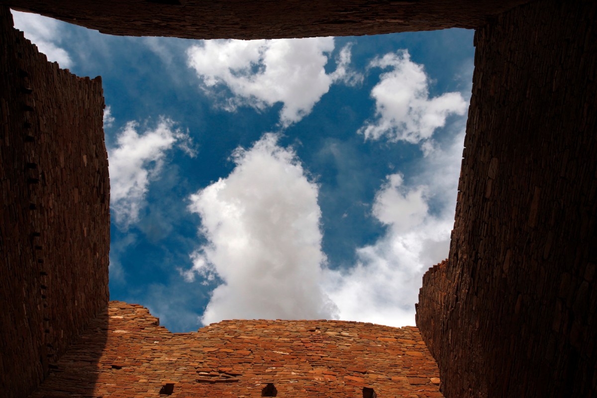 The sky as seen from a room believed to serve as as a storeroom for merchants or other residents of the pre-Colombian settlement on Wednesday, Oct. 6, 2021, at Chaco Culture National Historical Park, New Mexico. Top officials with the largest Native American tribe in the United States are renewing a request for congressional leaders to hold a field hearing before deciding on federal legislation aimed at limiting oil and gas development around Chaco Culture National Historical Park.
