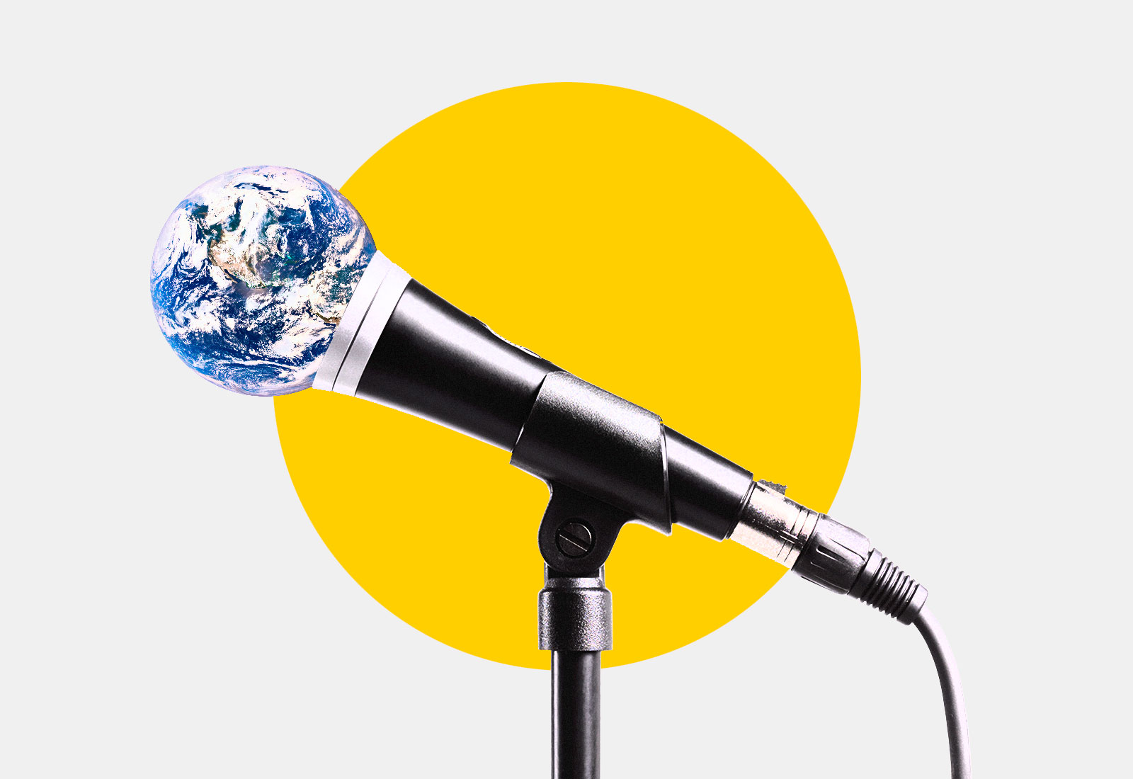 Side view of microphone with earth attached to end, yellow circle in background
