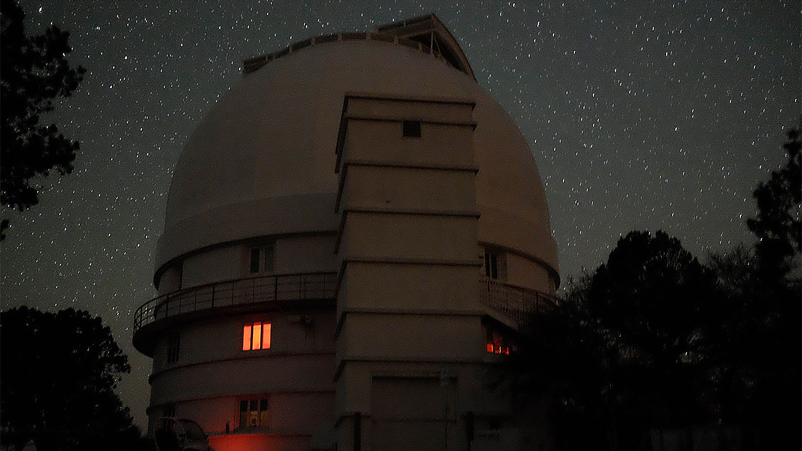 A picture of a massive, white-domed telescope.