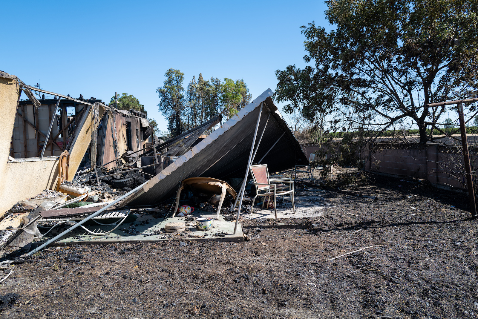 The remains of a home that burned are left abandoned on July 04, 2022 in Fresno, California.