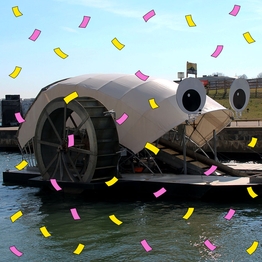 Photo of Mr. Trash Wheel with hand-drawn confetti over top