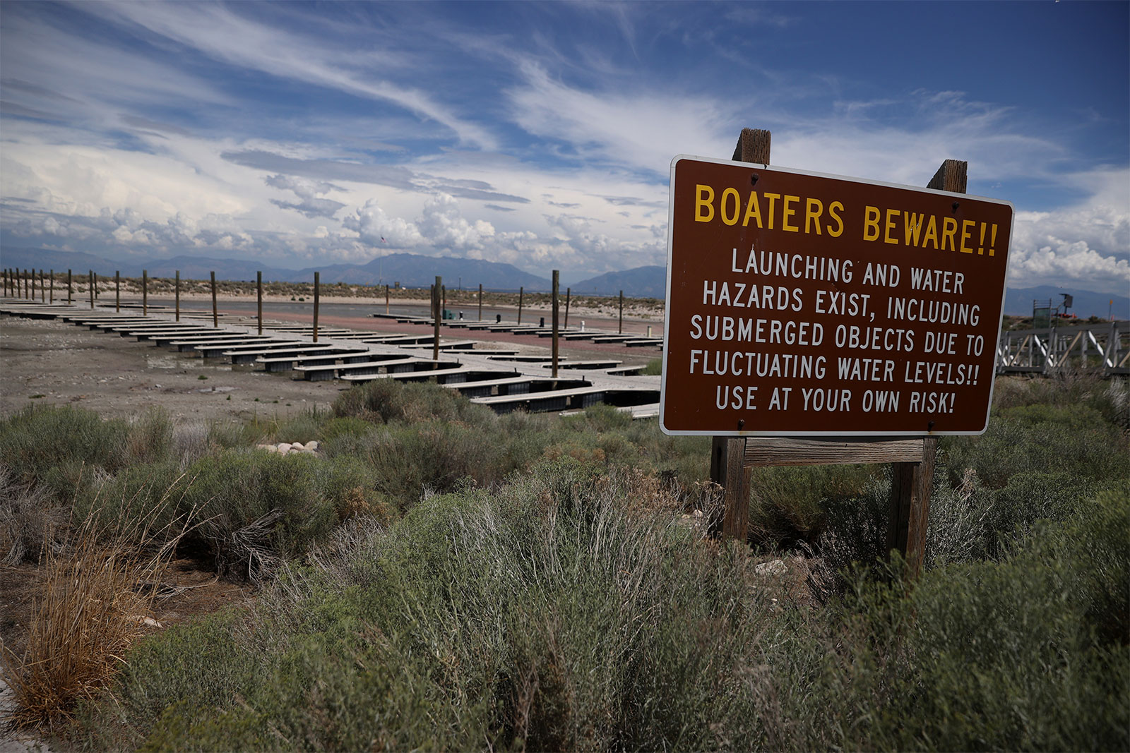 Sign at Great Salt Lake warning boaters of low water levels
